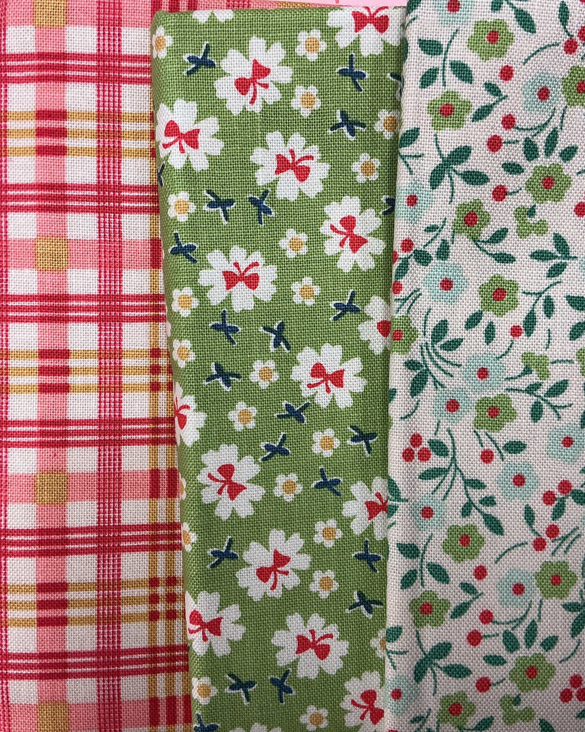 4 Yard Quilt Bundle with red and green floral and plaid fabric pieces for quilting projects