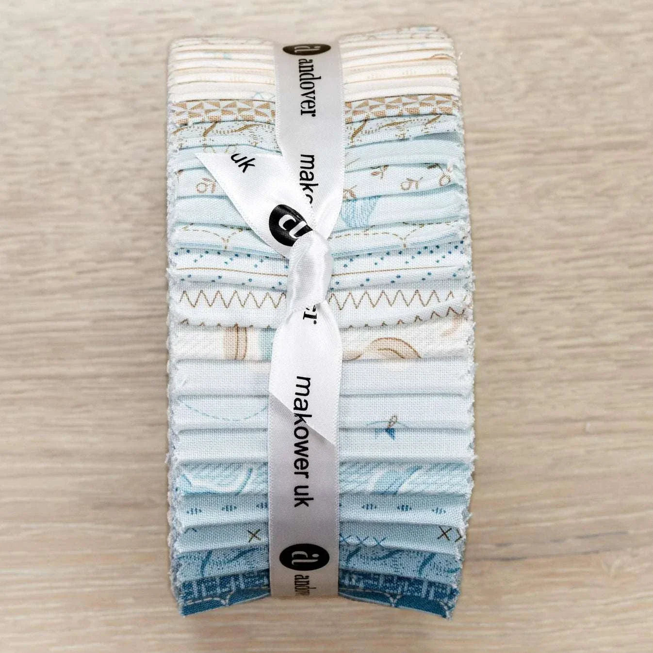 Sewing Bird Jelly Roll fabric bundle with 40 blue and neutral 2.5-inch strips by Edyta Sitar