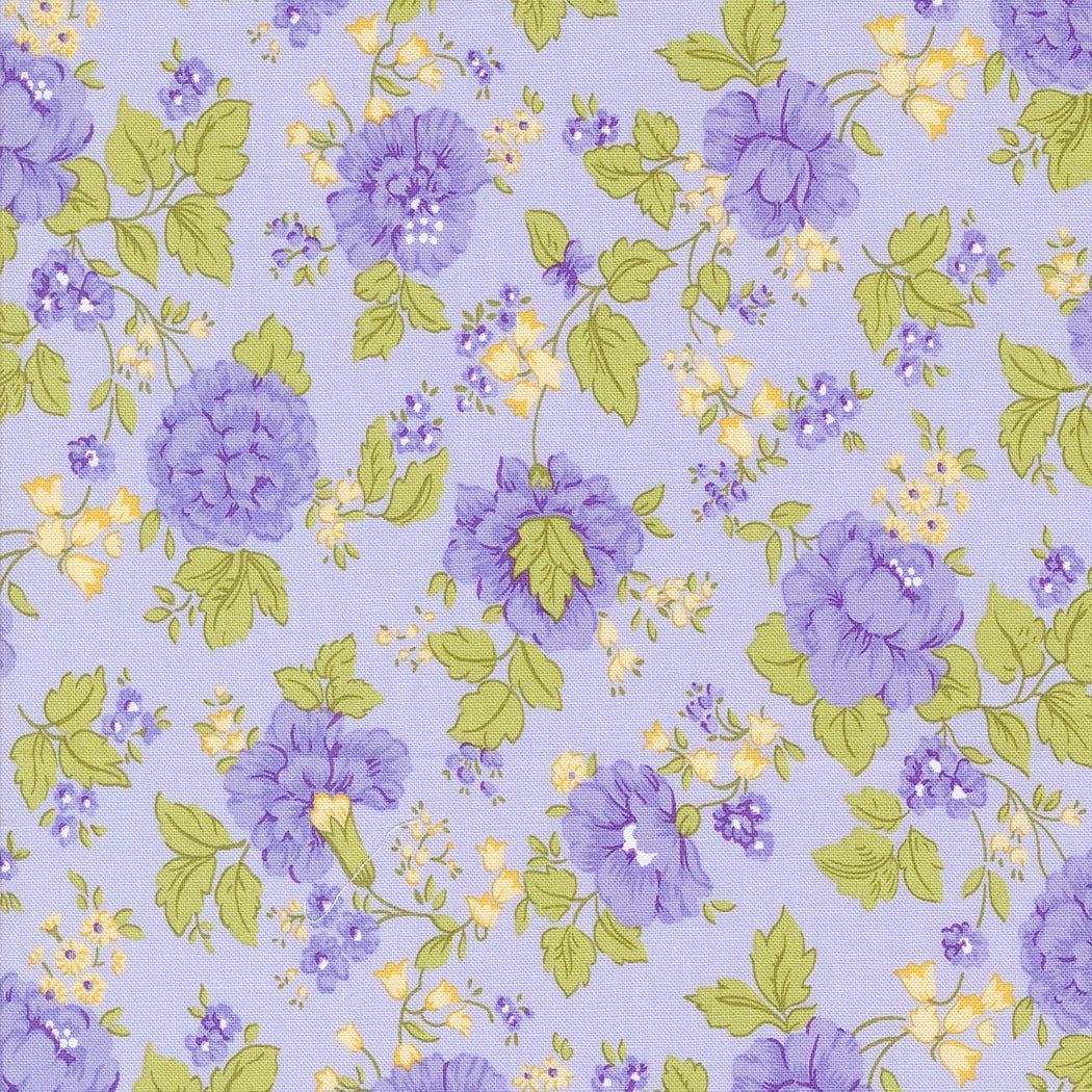 Georgia by Brenda Riddle floral fabric with purple flowers and green leaves on lavender background
