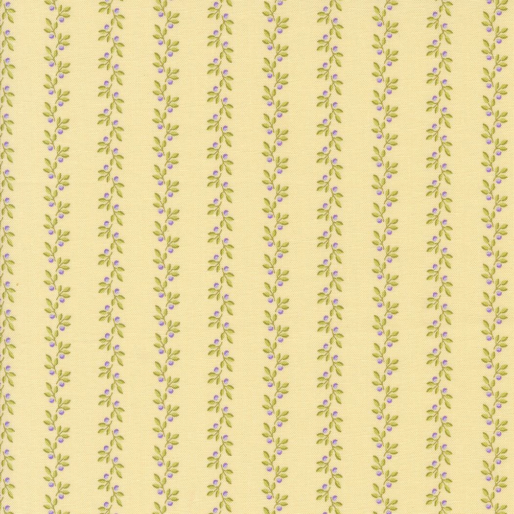 Georgia by Brenda Riddle soft yellow floral fabric with green and purple vine pattern