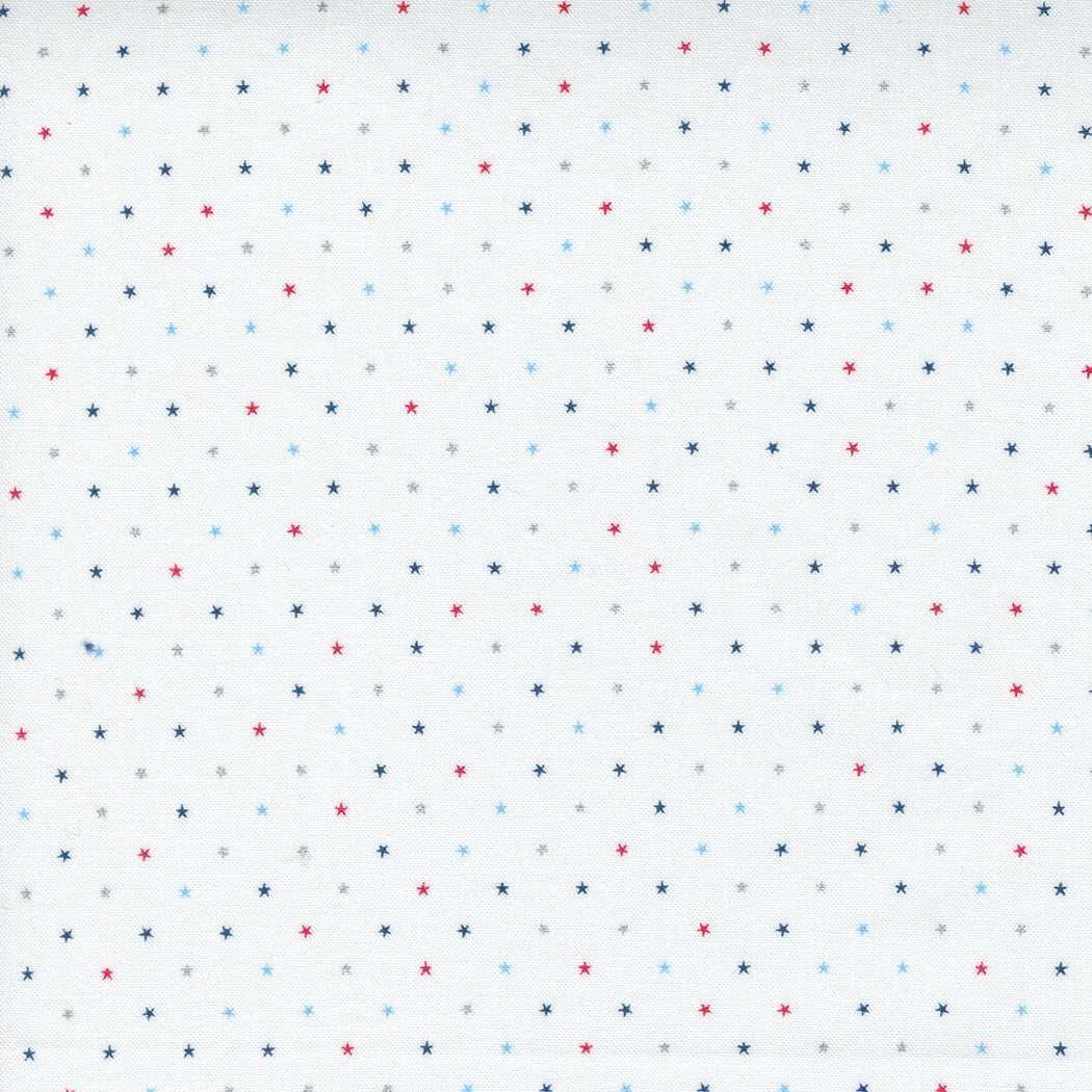 Twinkle by April Rosenthal metallic patriotic fabric with red and blue stars on white background