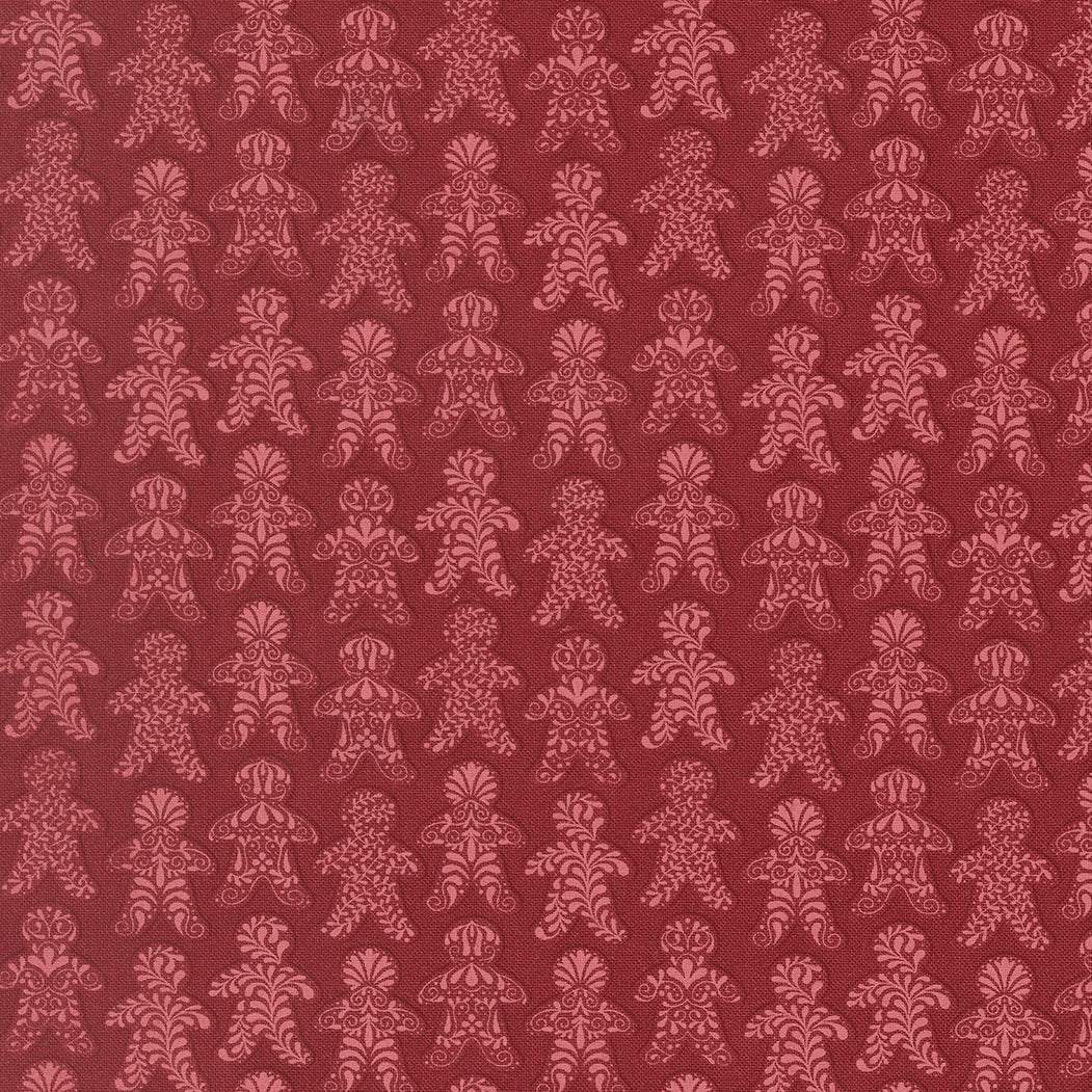 Gingerbread Lane Christmas fabric featuring gingerbread houses, candy canes, and snowflakes by Kiley Ferons for Moda Fabrics