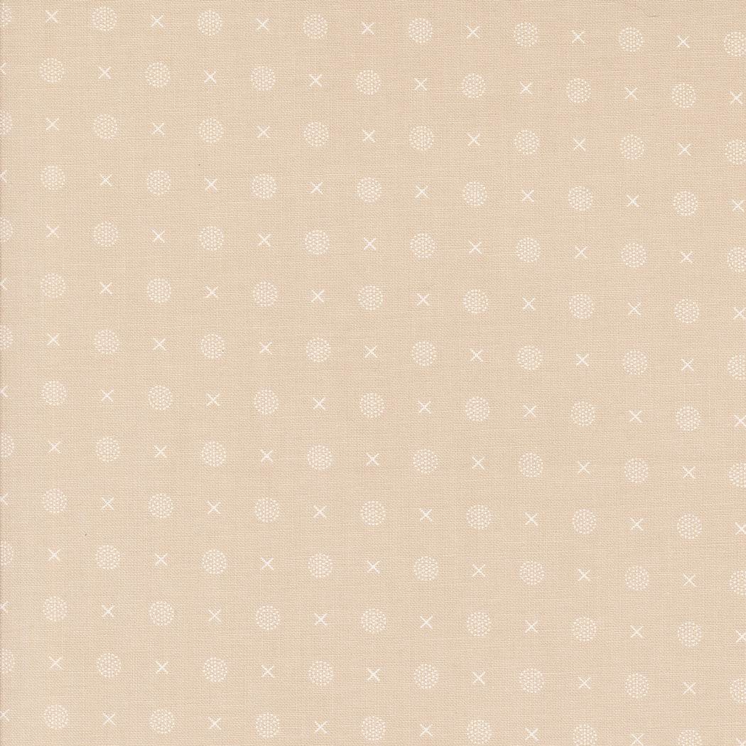 Abloom by Corey Yoder Stone X O Dots fabric in beige with white dotted and cross patterns for quilting and crafts