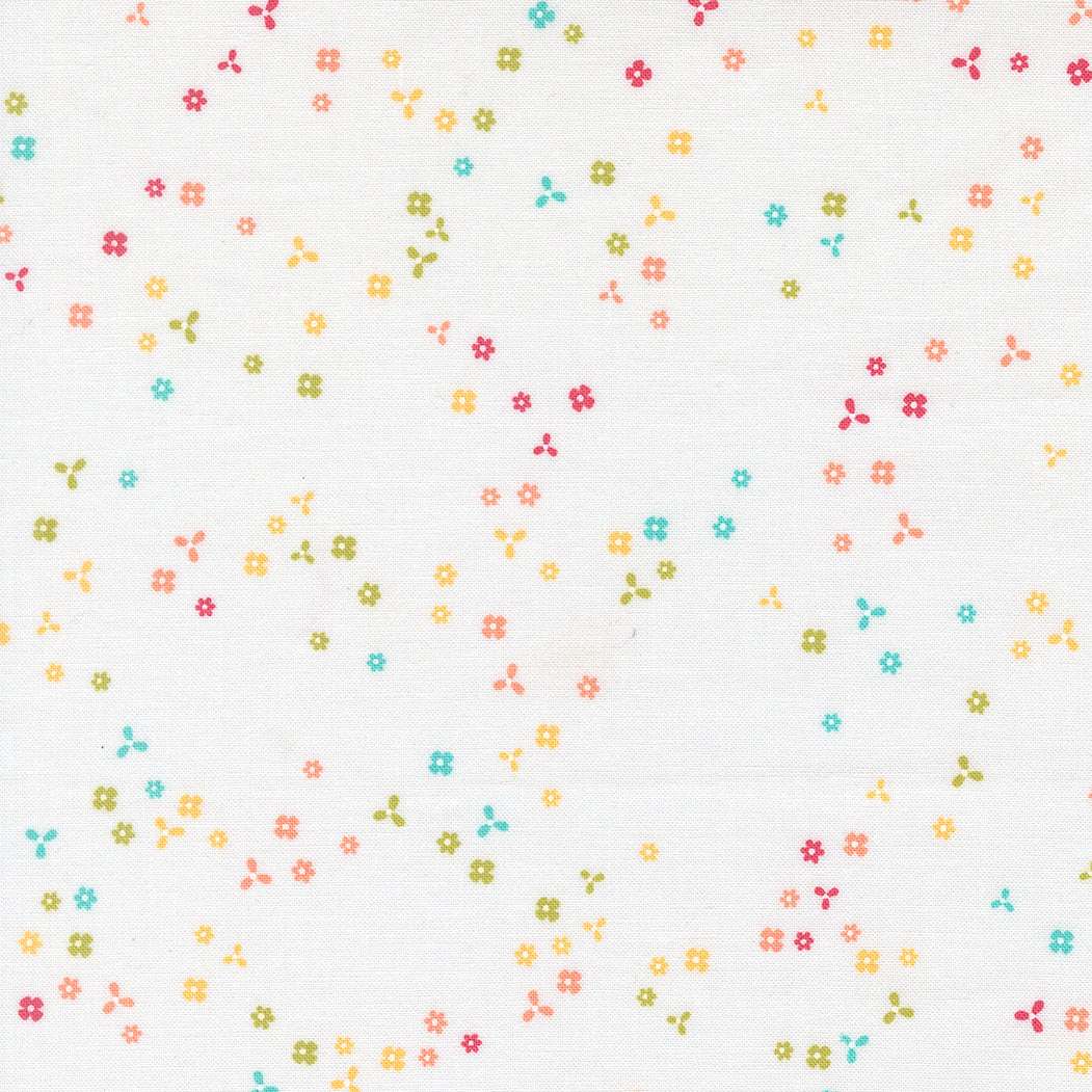 In the Garden Flutter Off White fabric with small multicolored floral print by Corey Yoder for Moda Fabrics