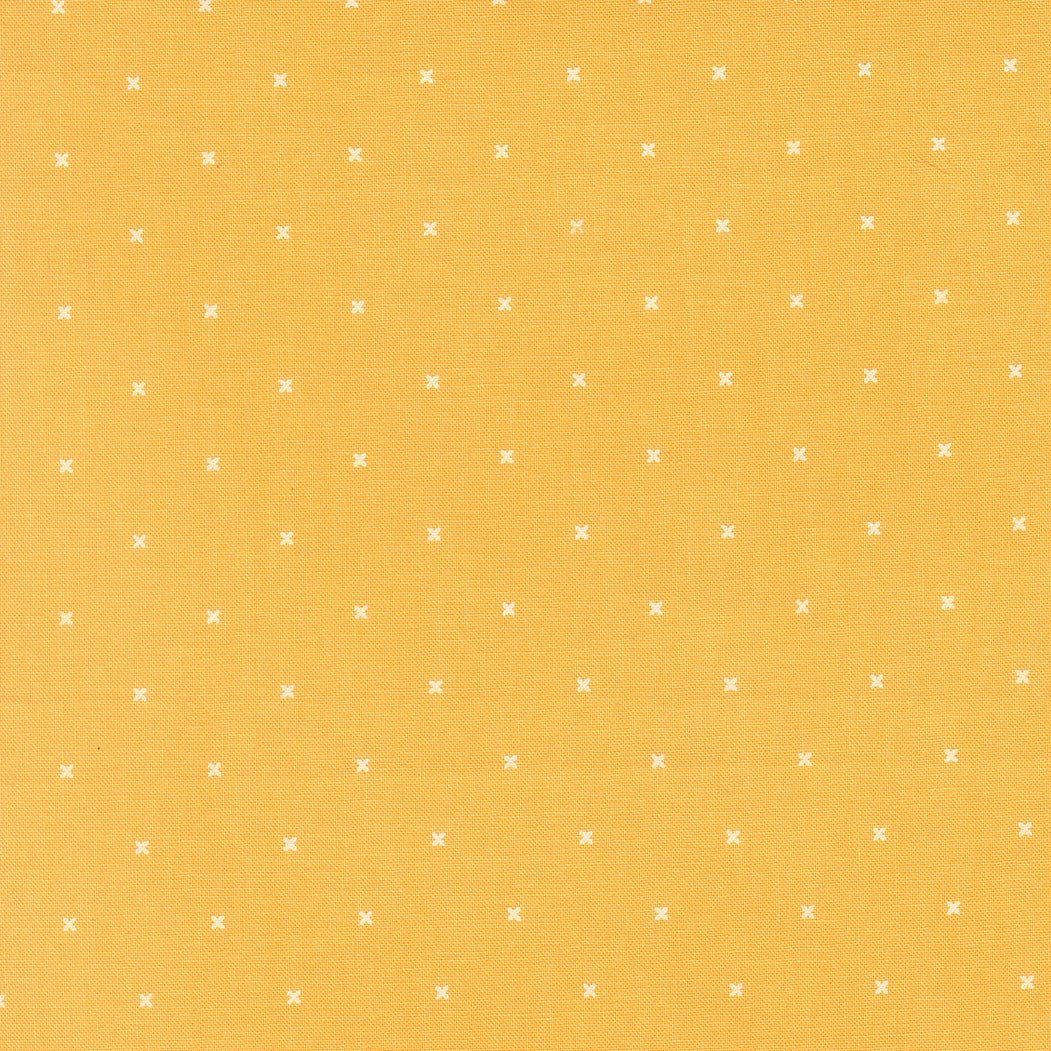 In the Garden Tiny Peel Goldenrod fabric by Corey Yoder for Moda, yellow fabric with small white cross pattern