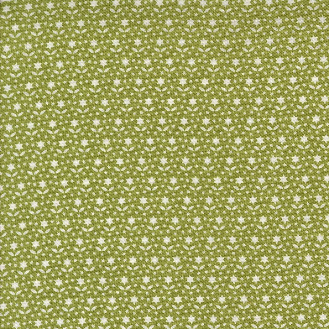 Buon Natale fabric by Joanna Figueroa green cotton with white star pattern for holiday sewing