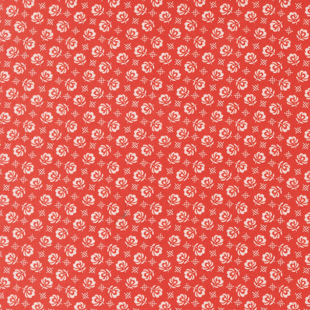 Rosie Prairie Toss Blender Strawberry fabric with small white floral pattern on red background by Joanna Figueroa for Moda Fabrics