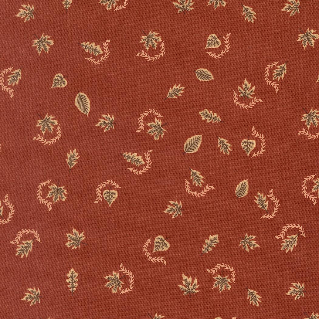 Windfall Autumn Breeze Rust fabric by Stephanie Sliwinski showcasing autumn leaves and sunflowers in warm rust tones