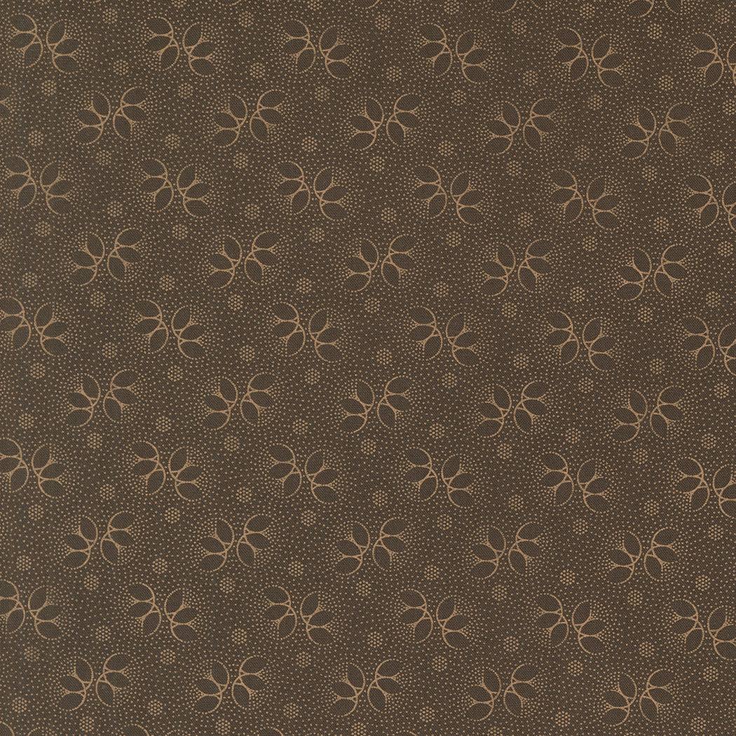 Chocolate brown fabric with textural dot and abstract floral pattern from Collections for a Cause Unity by Marcus Howard for Moda Fabrics