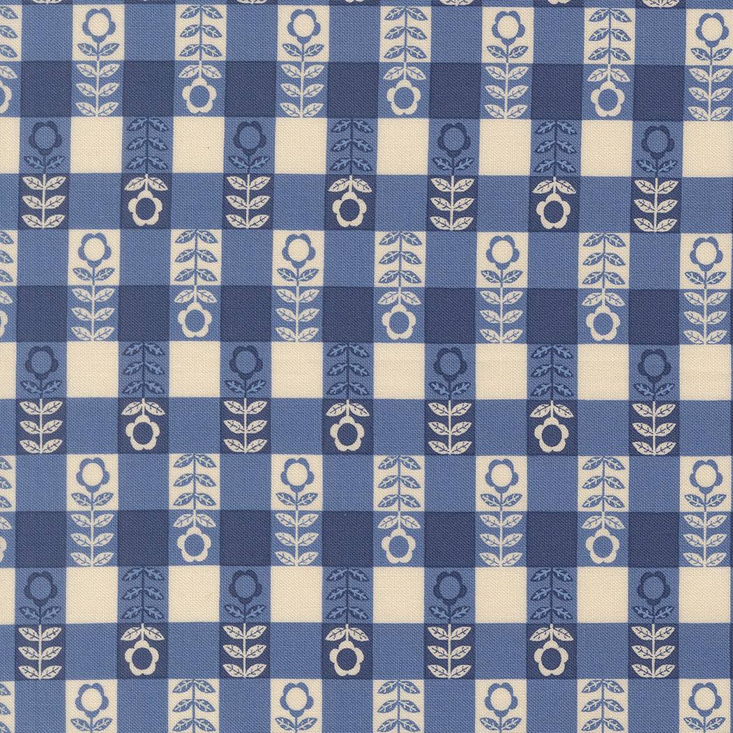 The Henhouse Flower Plaid Cobalt fabric by Gingiber for Moda Fabrics, featuring rustic country charm and playful barnyard designs