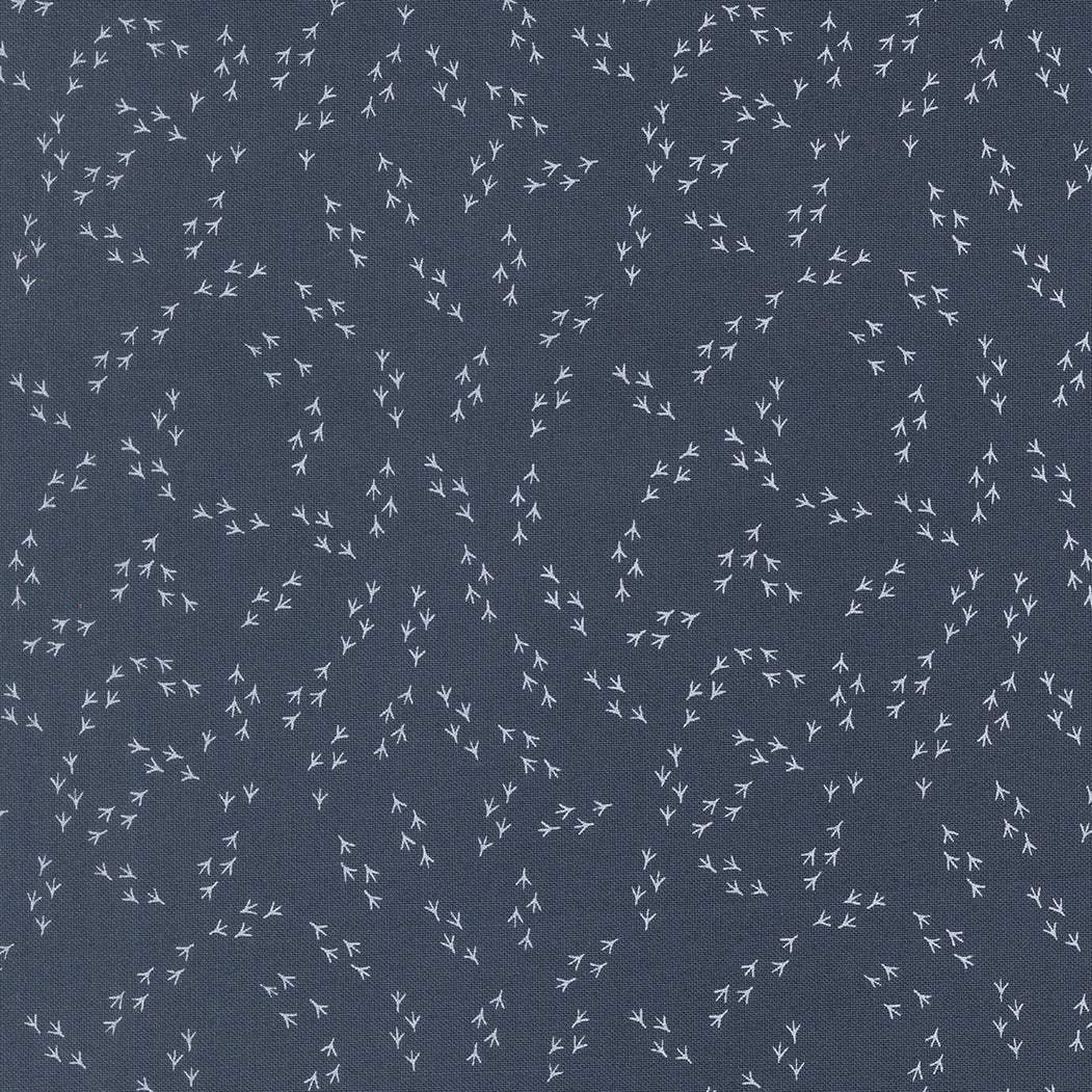 The Henhouse Chicken Feet denim fabric by Gingiber for Moda Fabrics with rustic barnyard charm sold in half-yard increments