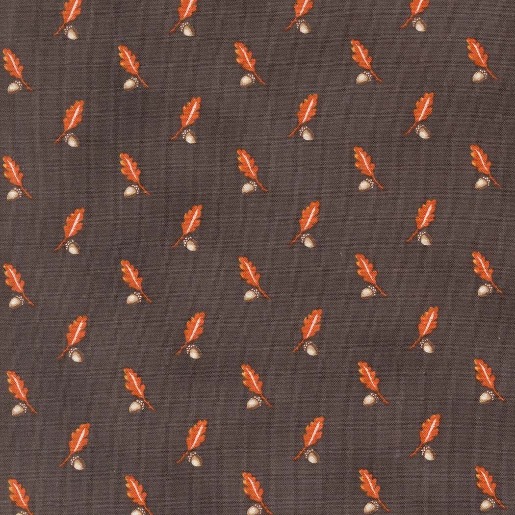 Pumpkin Spice fabric by Lisa Bongean with orange oak leaves and acorns on dark background for autumn quilting