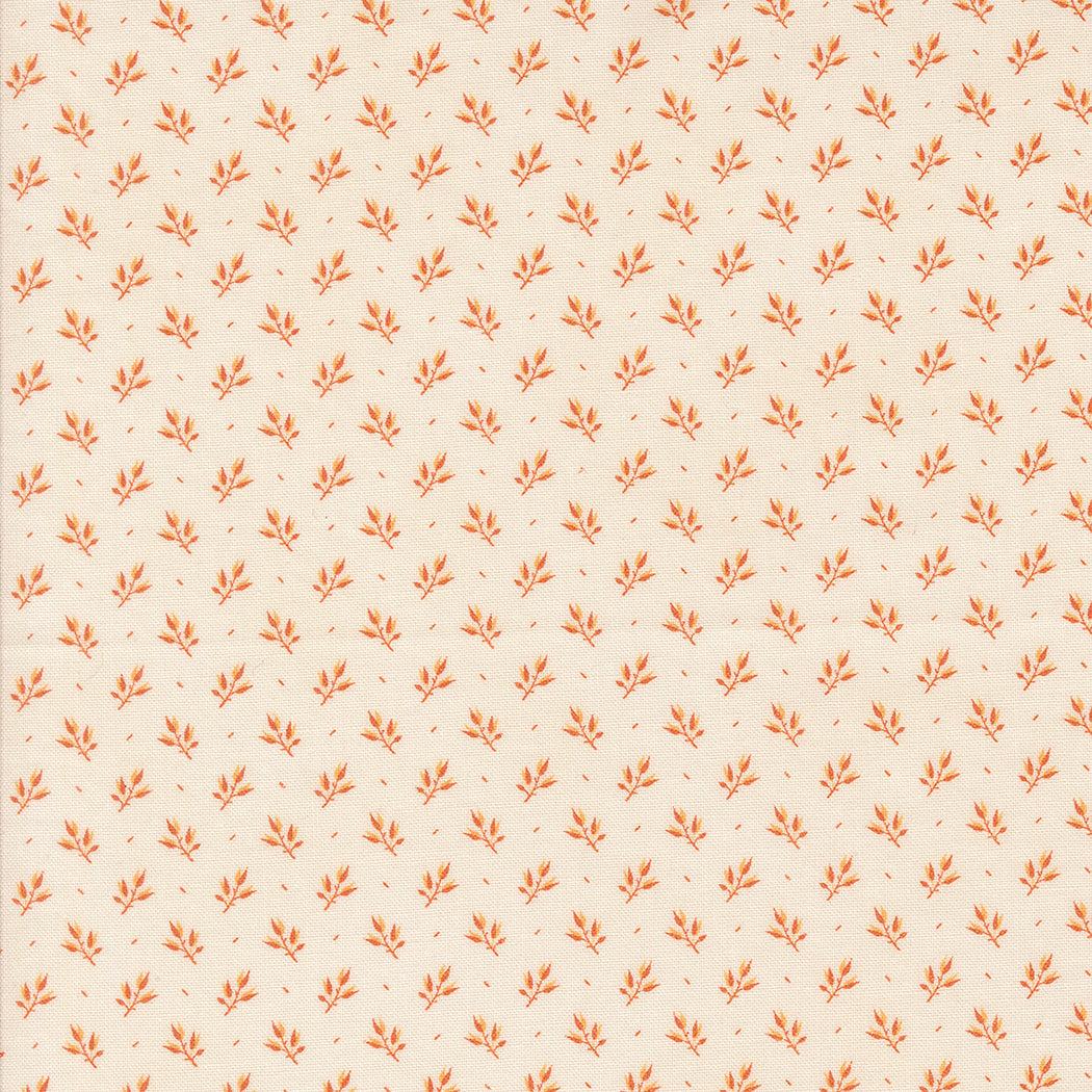Cream cotton fabric with small orange leaf pattern from Pumpkin Spice collection by Lisa Bongean