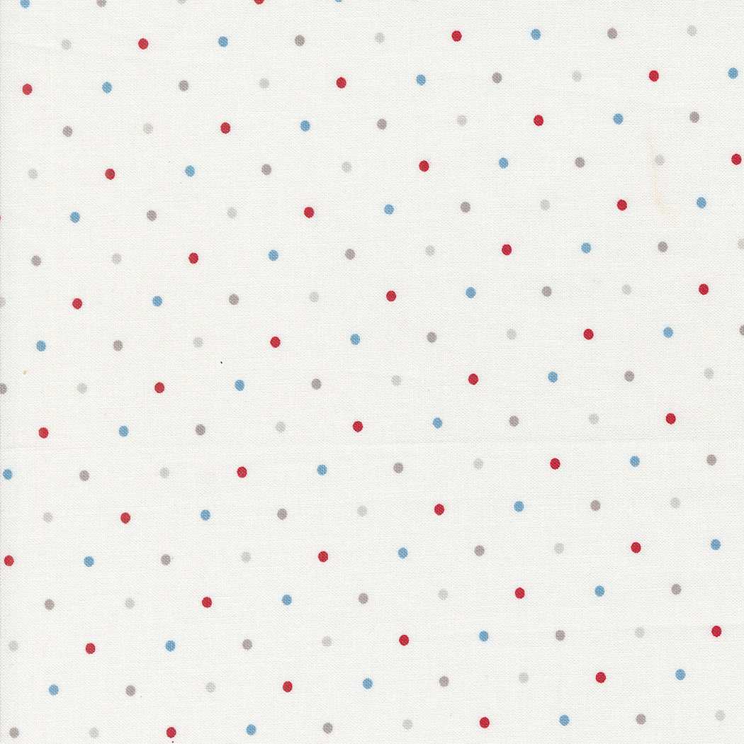 Magic Dot fabric with red, blue, and gray polka dots on white background by Vanessa Goertzen for Moda Fabrics