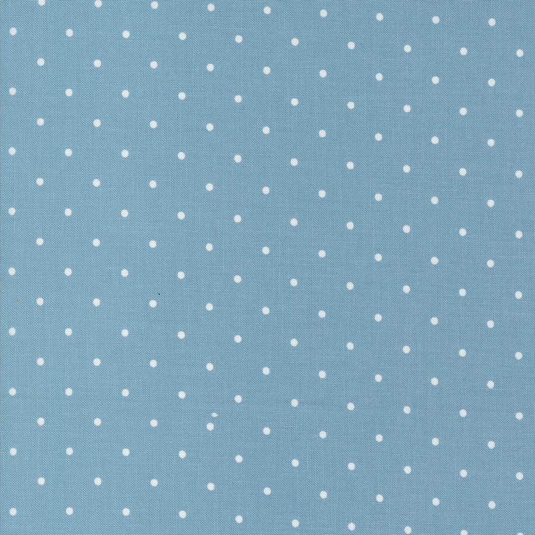 Magic Dot Blender Dots Sky fabric by Lella Boutique with white polka dots on sky blue background