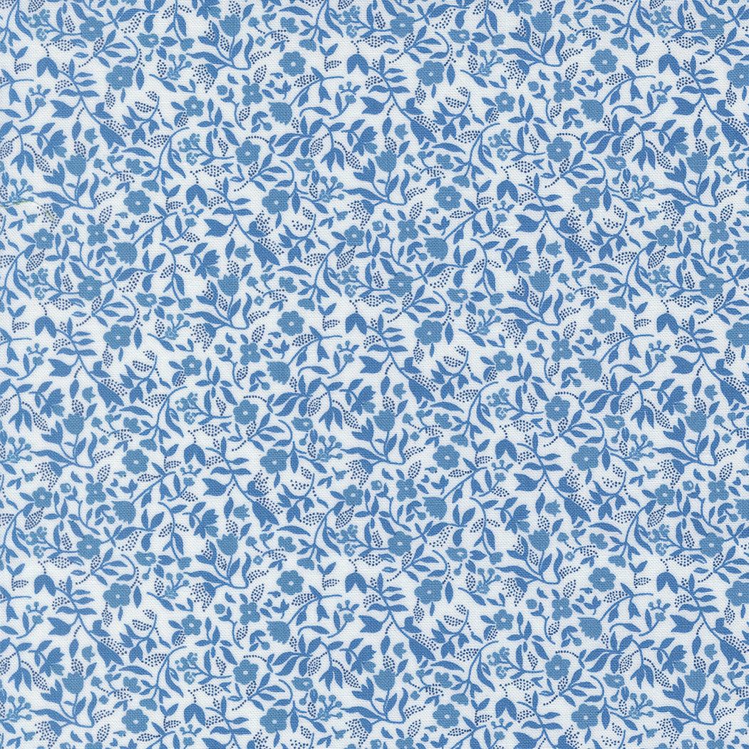 Blueprint Frolic Florals fabric with vintage blue floral pattern on white background by Camille Roskelley for Moda Fabrics