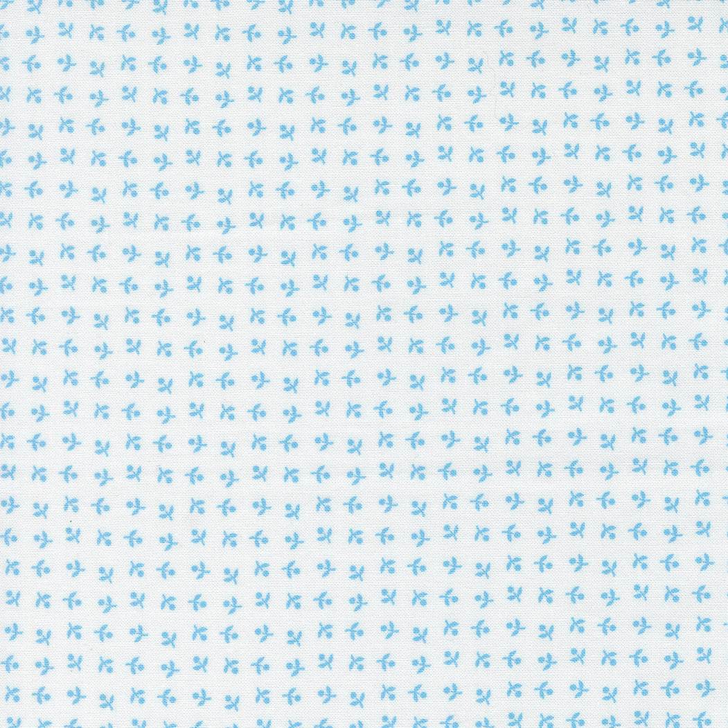 Blueprint Somerset White Harbor fabric by Camille Roskelley featuring small blue floral patterns on white background