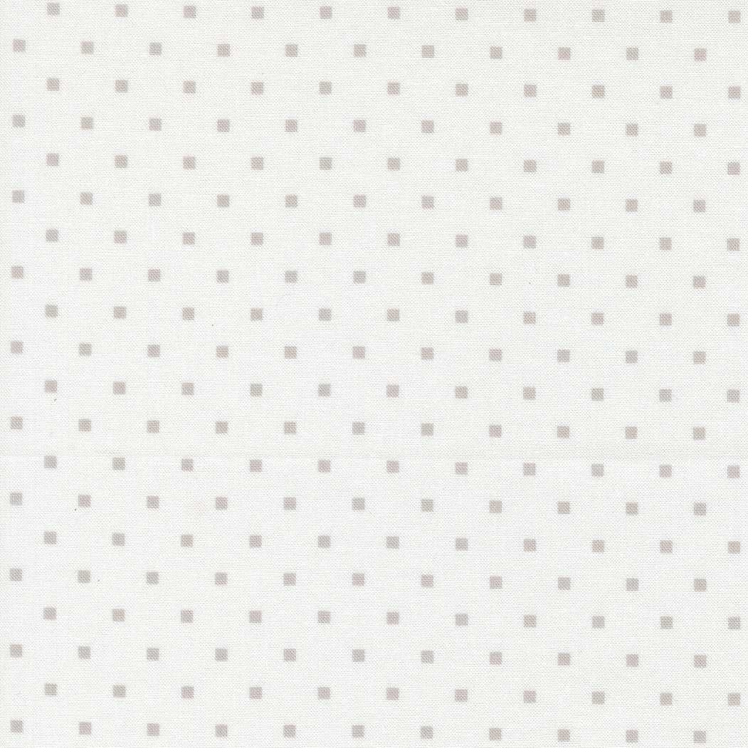 A Cat Named Stitch fabric by Camille Roskelley featuring cream grey cosmo dot pattern from Moda Fabrics