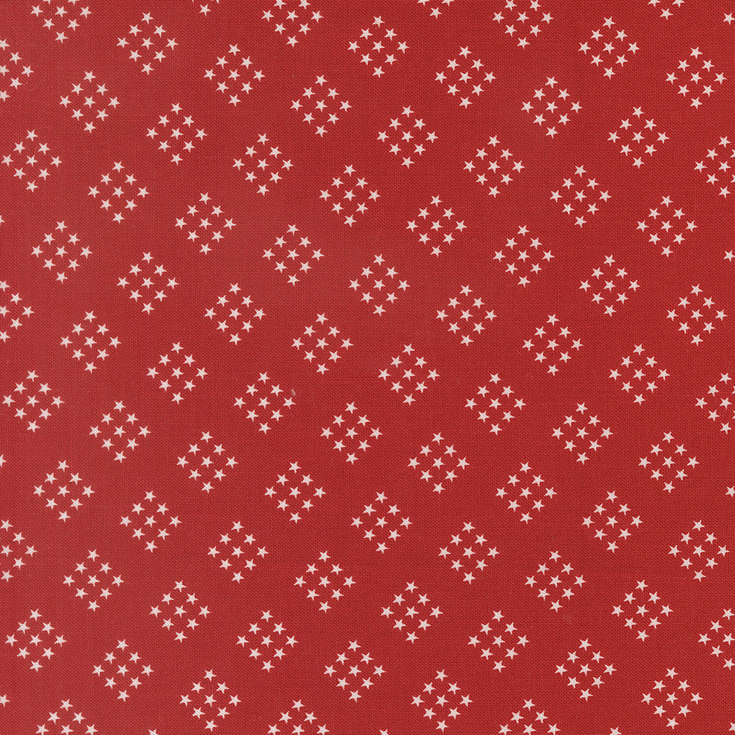 Independence Day Stars Red fabric by Sweetwater with patriotic star pattern in red, sold by Moda Fabrics in half-yard increments