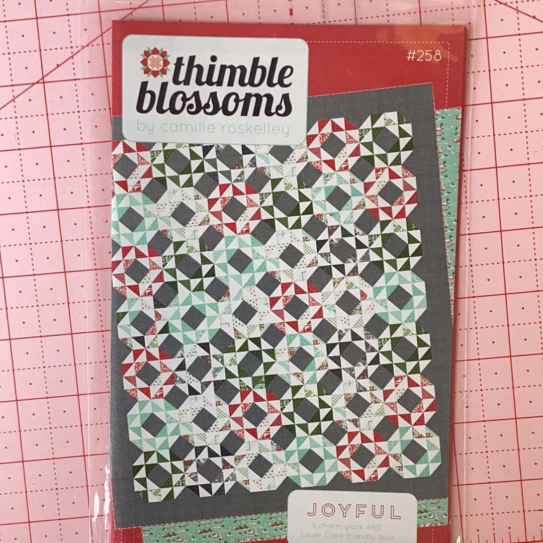 Joyful Pattern quilt design by Thimble Blossoms with colorful geometric prints