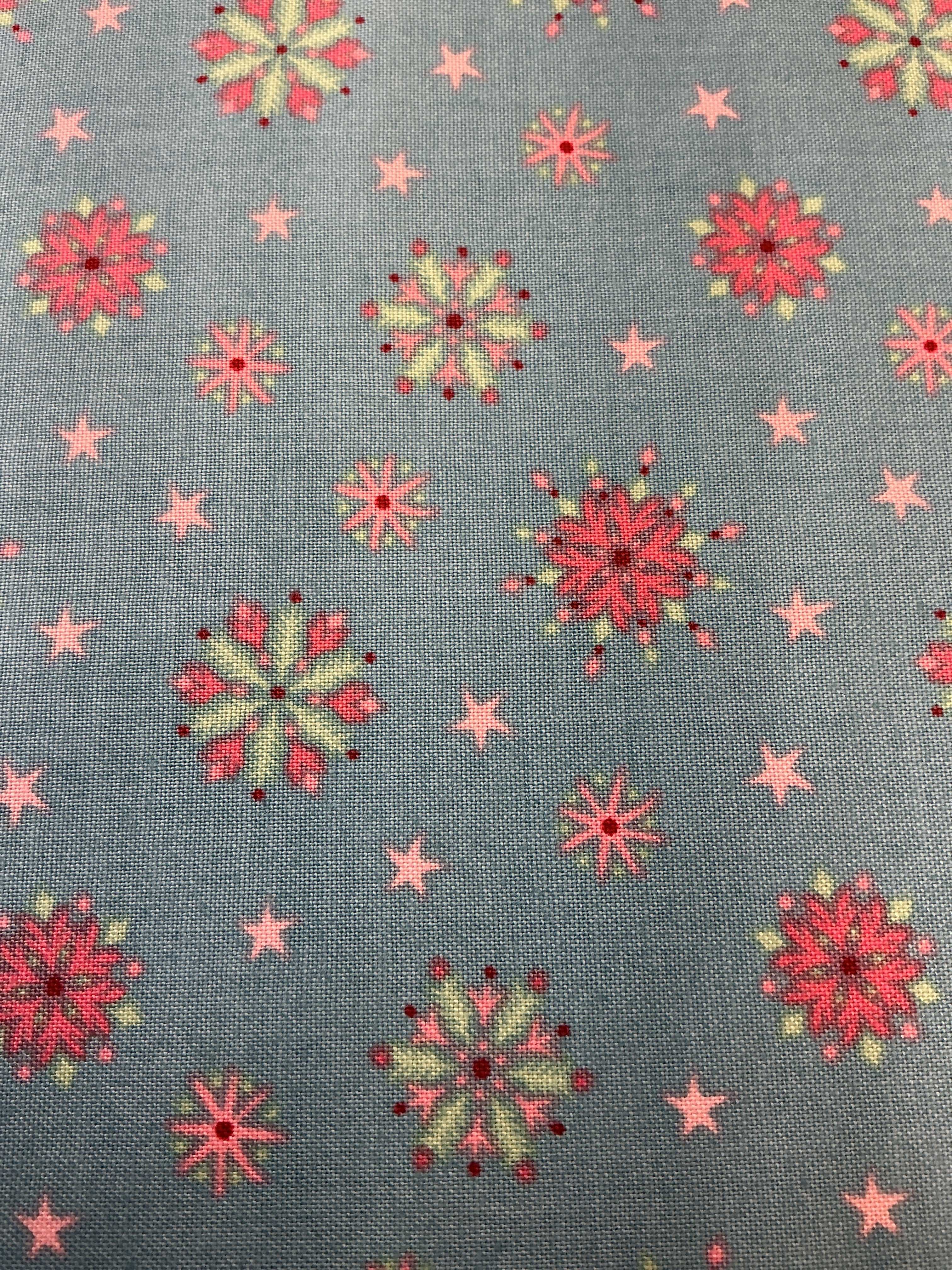 Rolls of fabric labeled 5-yard cuts on sale