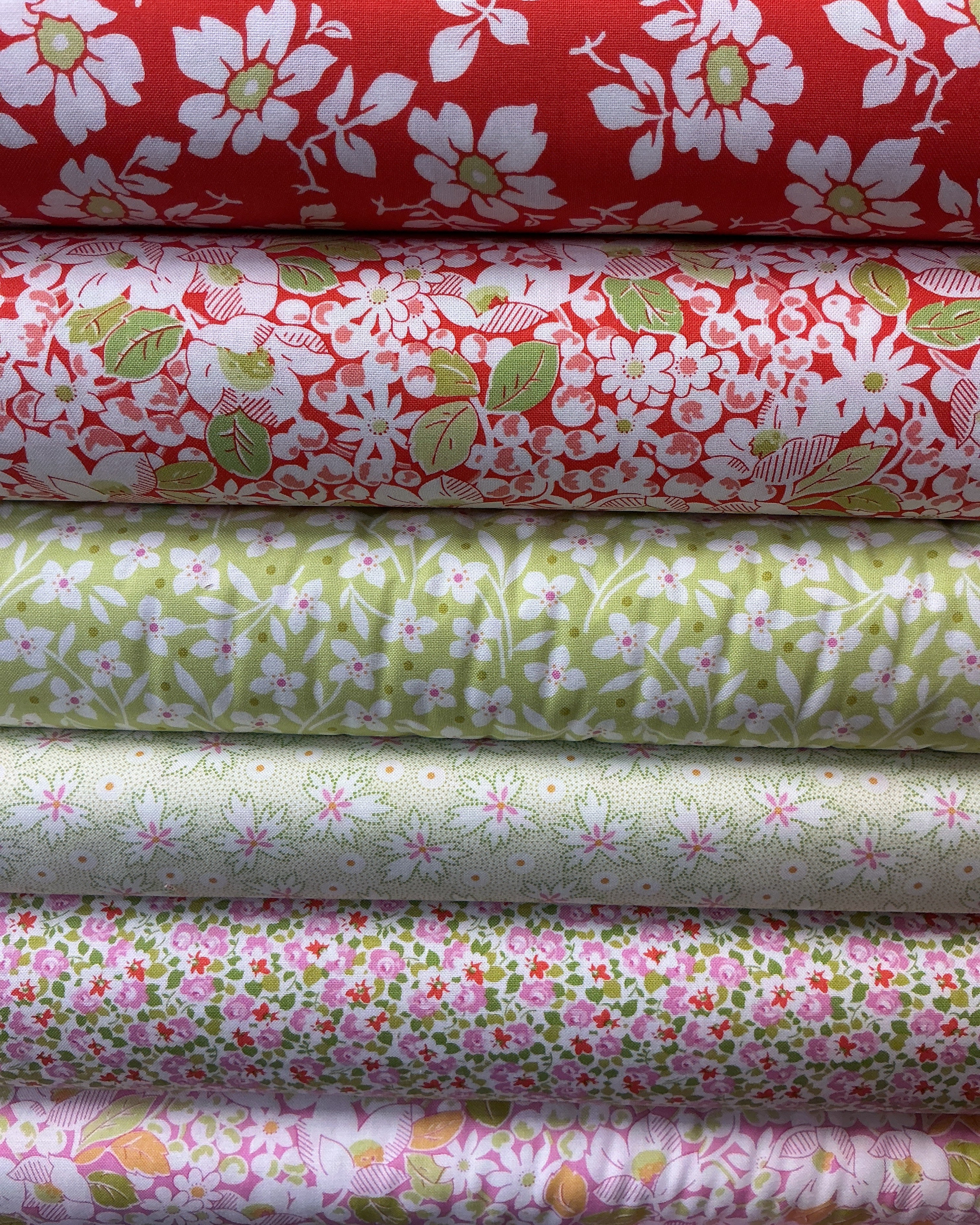 Six-Pack Party Bundle fabric cuts for quilting projects arranged flat