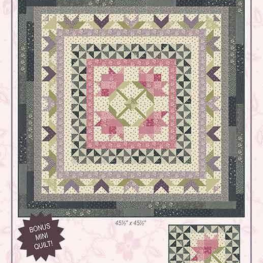 Lilacs and Roses Quilt Kit featuring Goodnight Irene pattern by Betsy Chutchian for Moda Fabrics showing intricate 45x45 inch quilt design