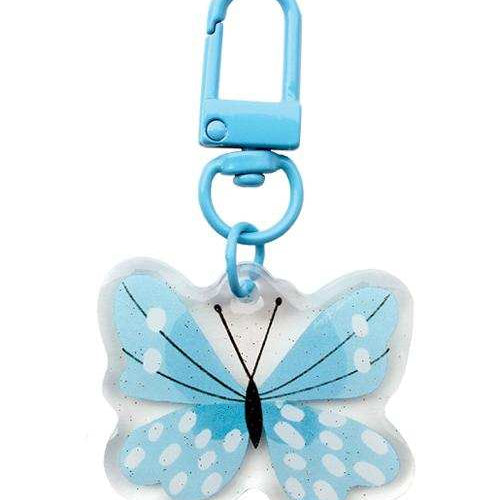 Blue butterfly zipper charm with acrylic epoxy resin and glitter by Lizzy House