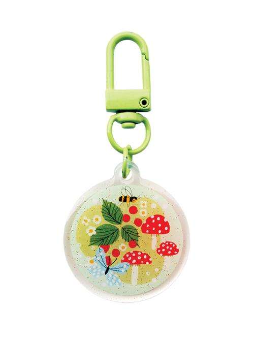Zipper charm with Tiny Meadow design featuring glitter epoxy resin and green clasp