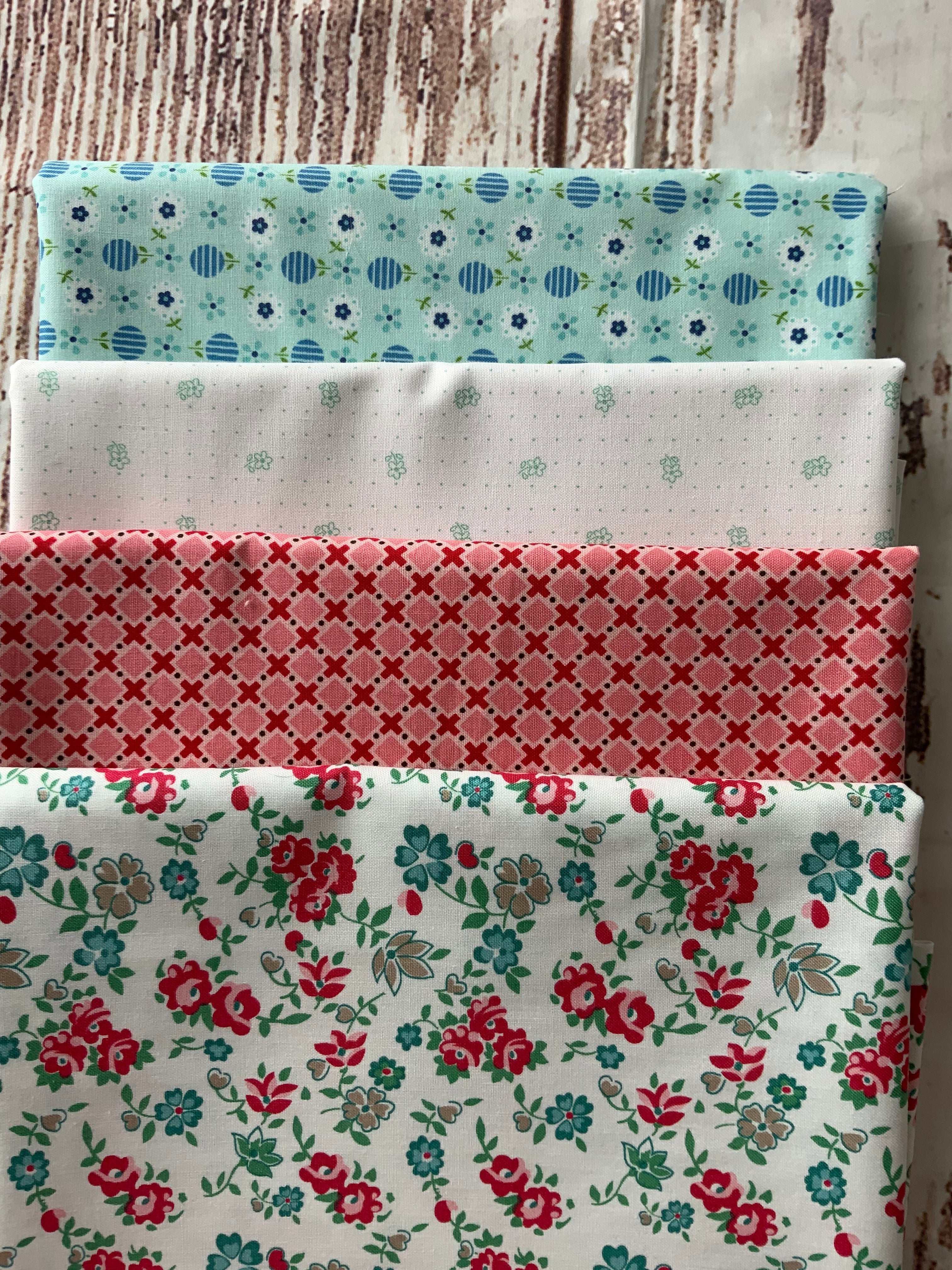 4-Yard Quilt Kit fabric bundle with blue, white, red, and floral prints