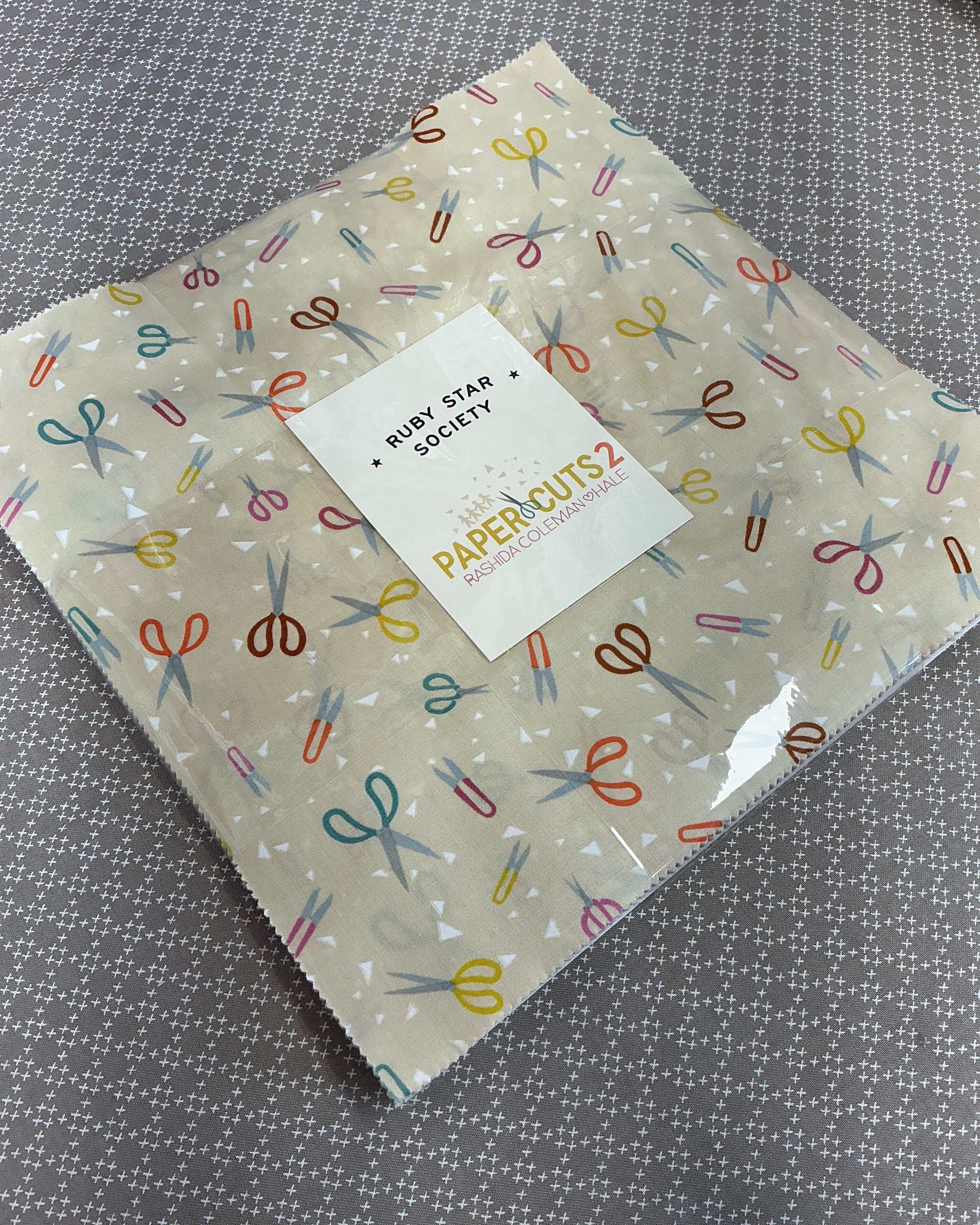 Frida Lap Size Quilt Kit with 12 half-yard fabric cuts, free digital pattern, accent and binding included for sewing a lap-size quilt