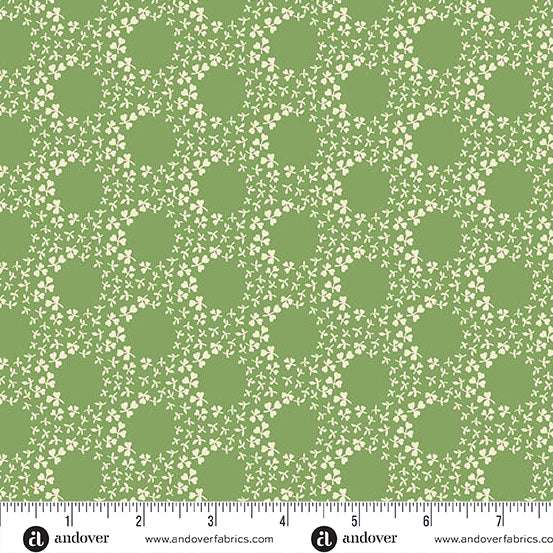 Green fabric with white clover rings pattern from Little Clover by Andover Fabrics