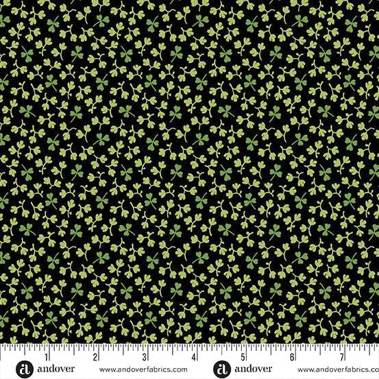 Little Clover by Andover Fabrics black fabric with small green clover patterns for spring and St. Patrick's Day crafts