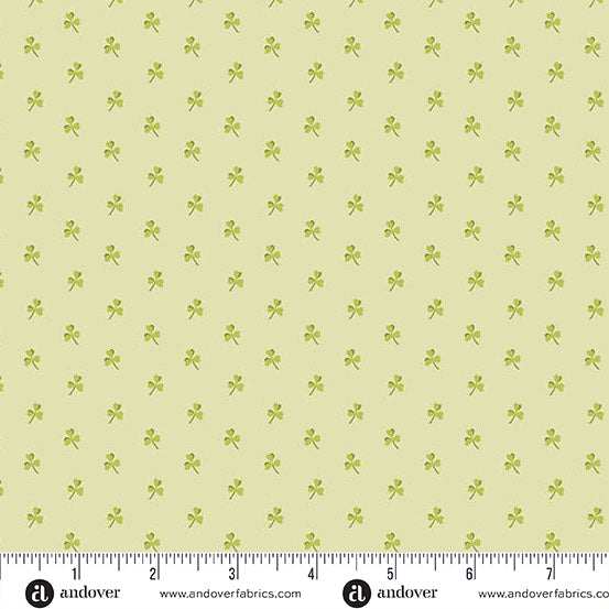 Little Clover by Andover Fabrics grellow fabric with small green clovers and polka dots pattern
