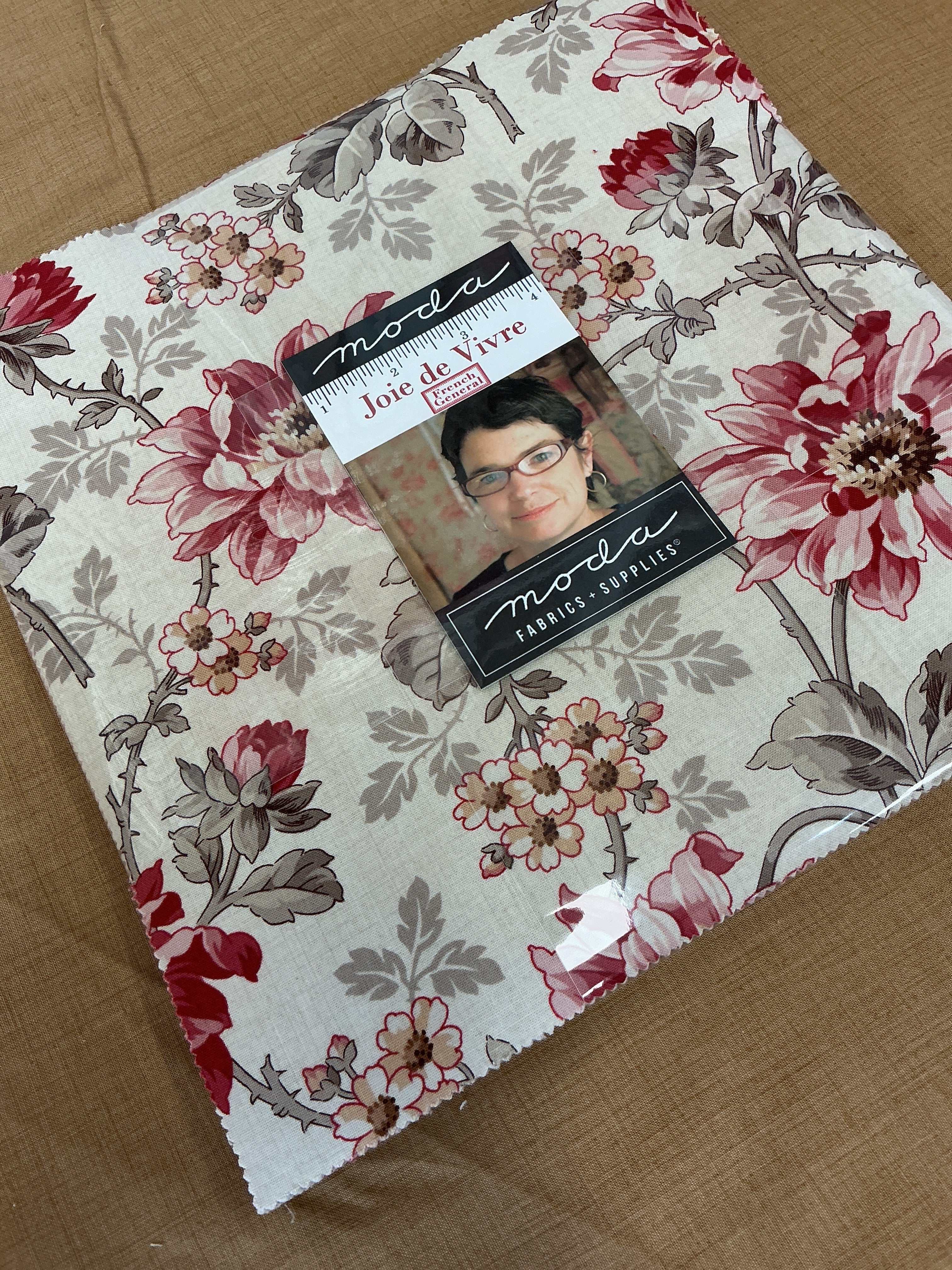 Frida Lap Size Quilt Kit with colorful half-yard fabric cuts and free digital sewing pattern