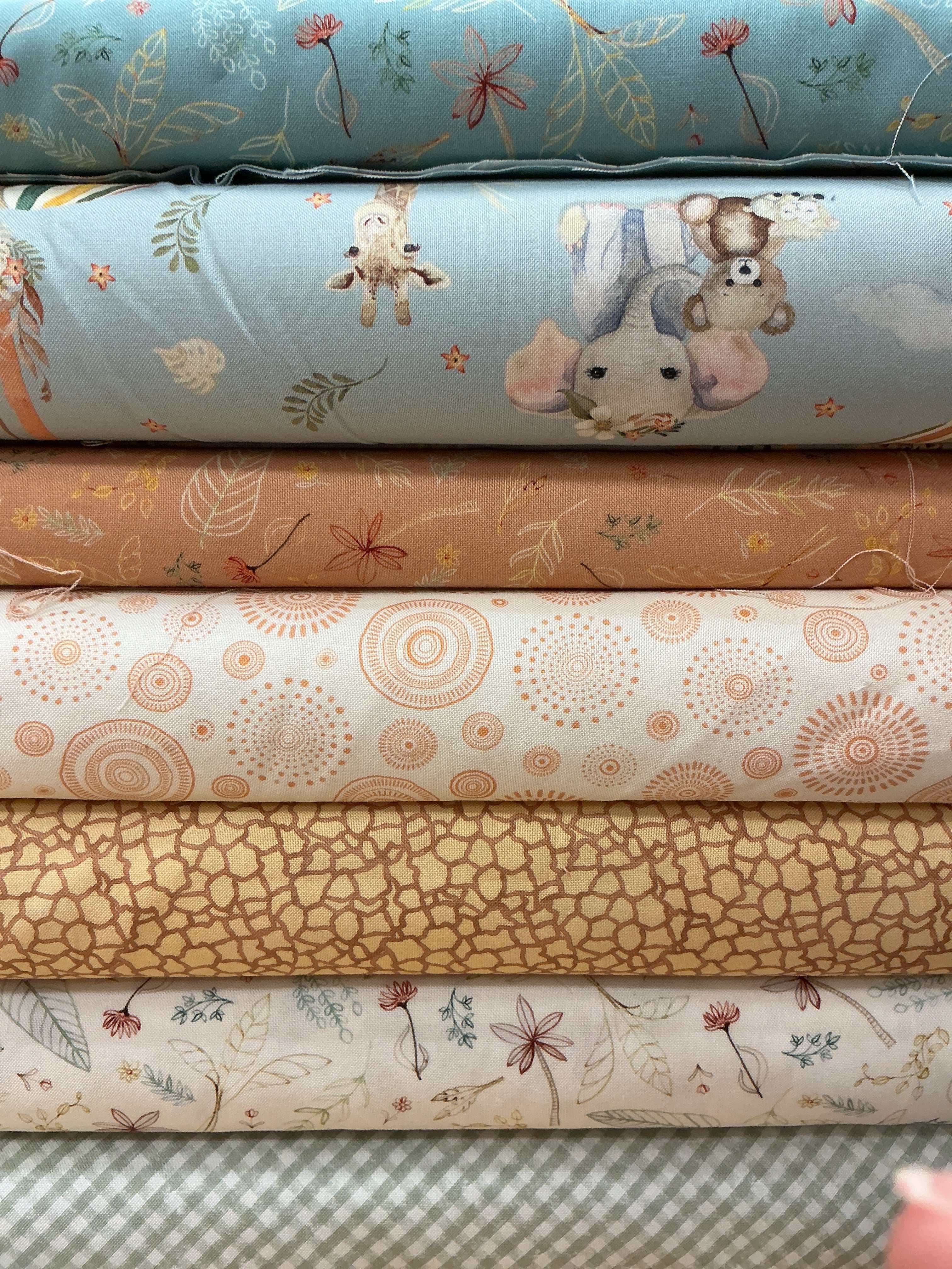 Six-Pack Party Bundle with seven coordinating 20-inch fabric cuts for quilting and sewing projects