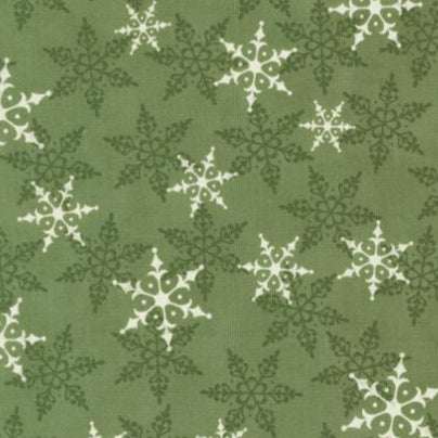 Winter Friends Pine fabric with white and green snowflakes on pine green background by Deb Strain for Moda Fabrics