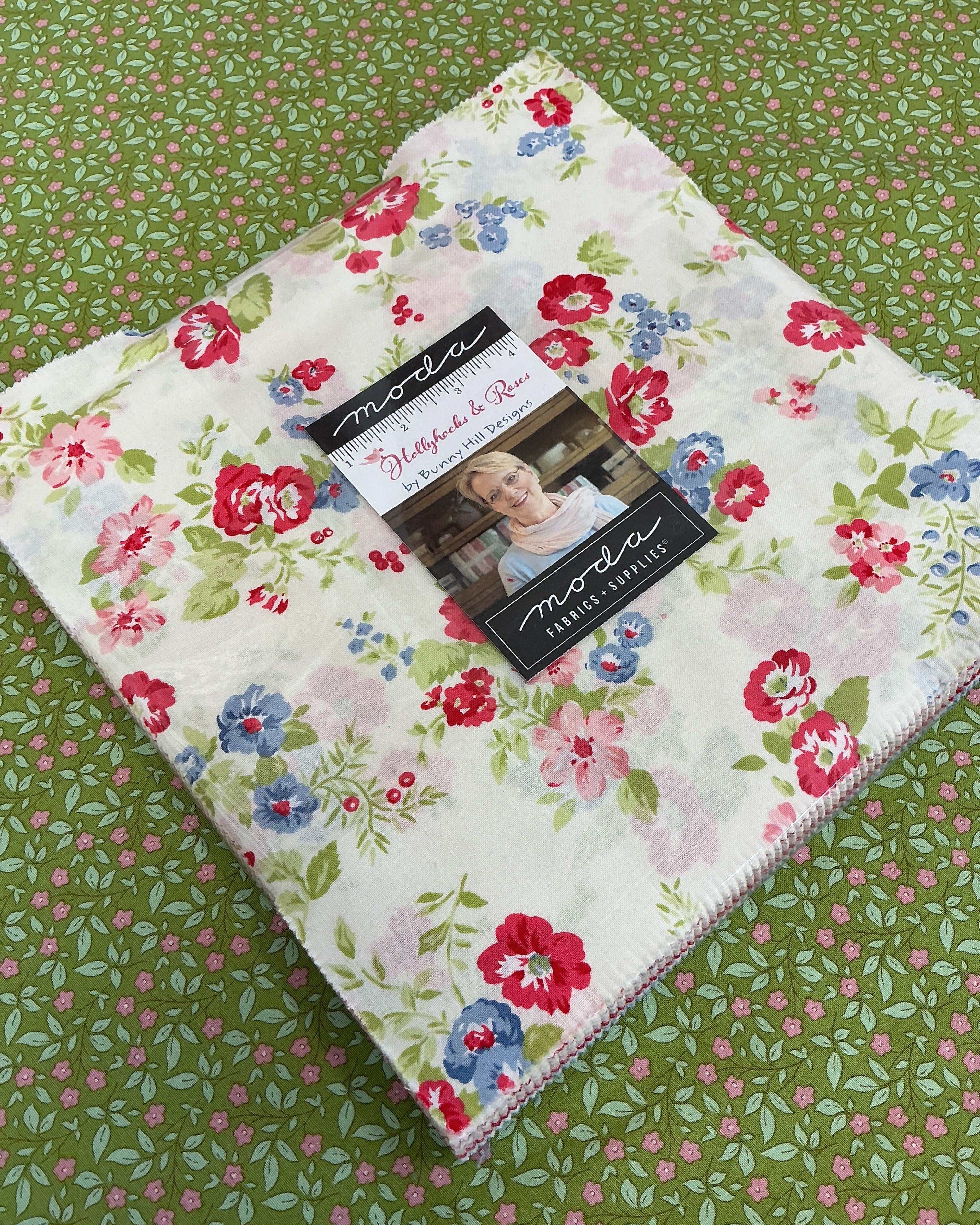 Frida Lap Size Quilt Kit with hollyhocks and roses fabric, pattern, and binding for sew-along project