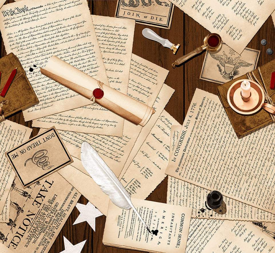 United We Stand fabric print with colonial American documents, quill, and antique patriotic elements in cream and brown letters