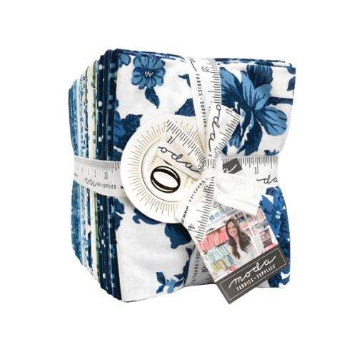 Blueprint Fat Quarter Bundle with vintage floral, dot, and plaid patterns in blue and white by Camille Roskelley for Moda Fabrics