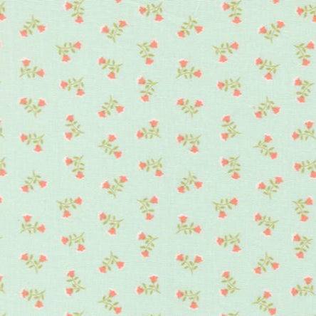 Sunbonnet Tossed Petals pale blue fabric with small pink floral print by Heather Briggs for Moda Fabrics