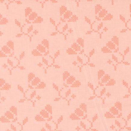 Sunbonnet Blooming Stitches Pink fabric with delicate floral cross-stitch pattern by Heather Briggs for Moda Fabrics