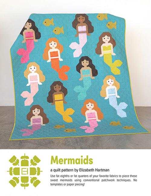 Mermaids quilt pattern by Elizabeth Hartman featuring colorful patchwork mermaids and fish on a blue background