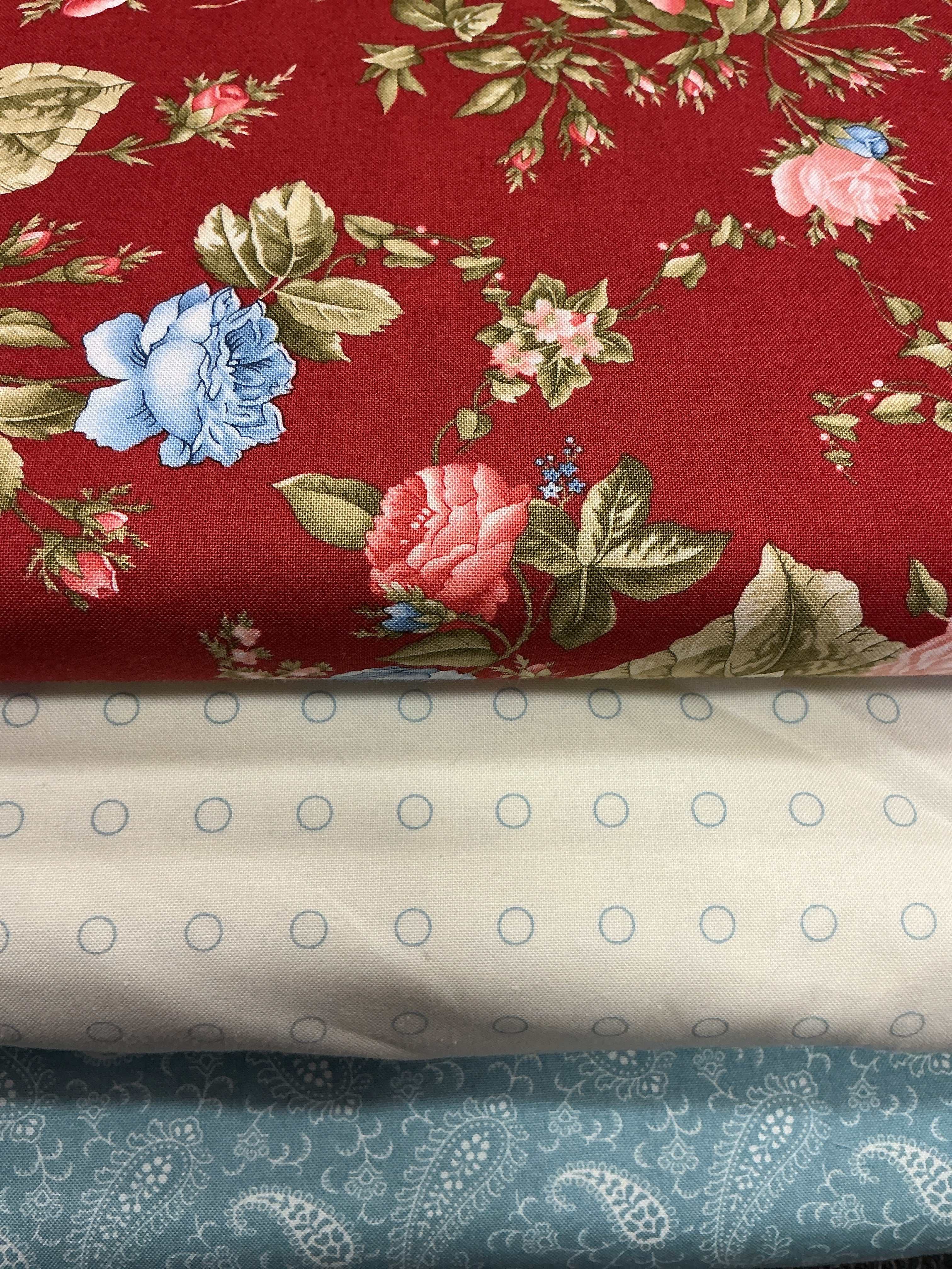 Three coordinating fabrics in a 3 Yard Quilt Bundle from Bella Rose Quilts for quilting and sewing projects