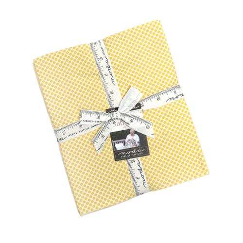 Pre-order Gathered Bonbons Half Yard Bundle by Jen Kingwell Designs with 8 coordinated fabric pieces wrapped with Moda measuring tape ribbon