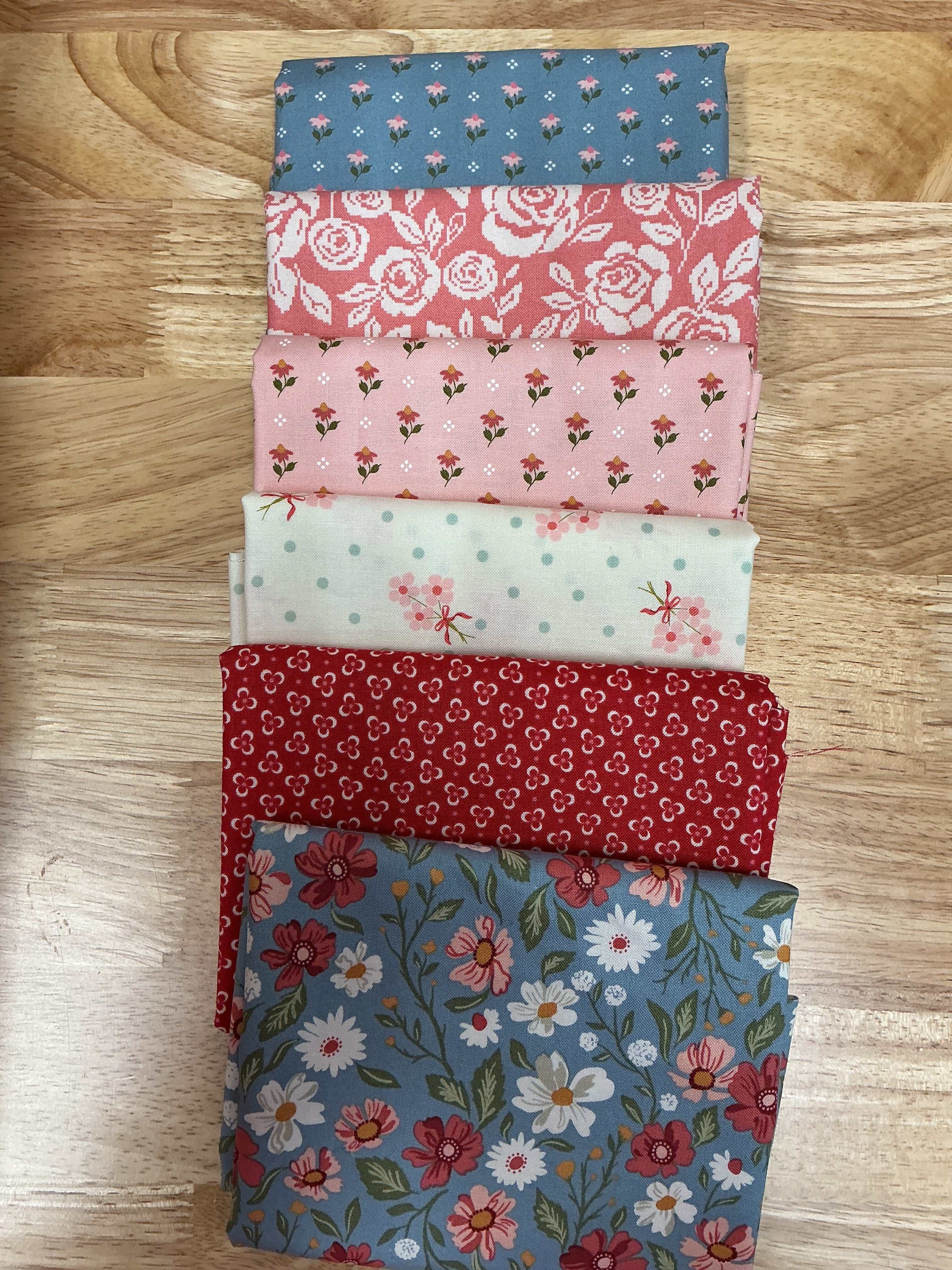M50 Happy Go Lucky quarter-yard fabric bundle curated by Bella Rose Quilts for mini mystery quilt event