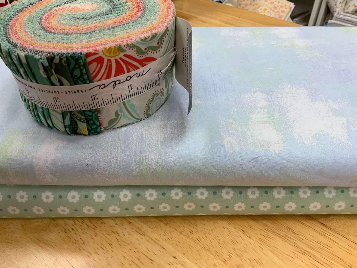 Project Jelly Roll Kit with Anasazi quilt pattern fabric roll and coordinating fabrics for 64x79 inch quilt top and binding