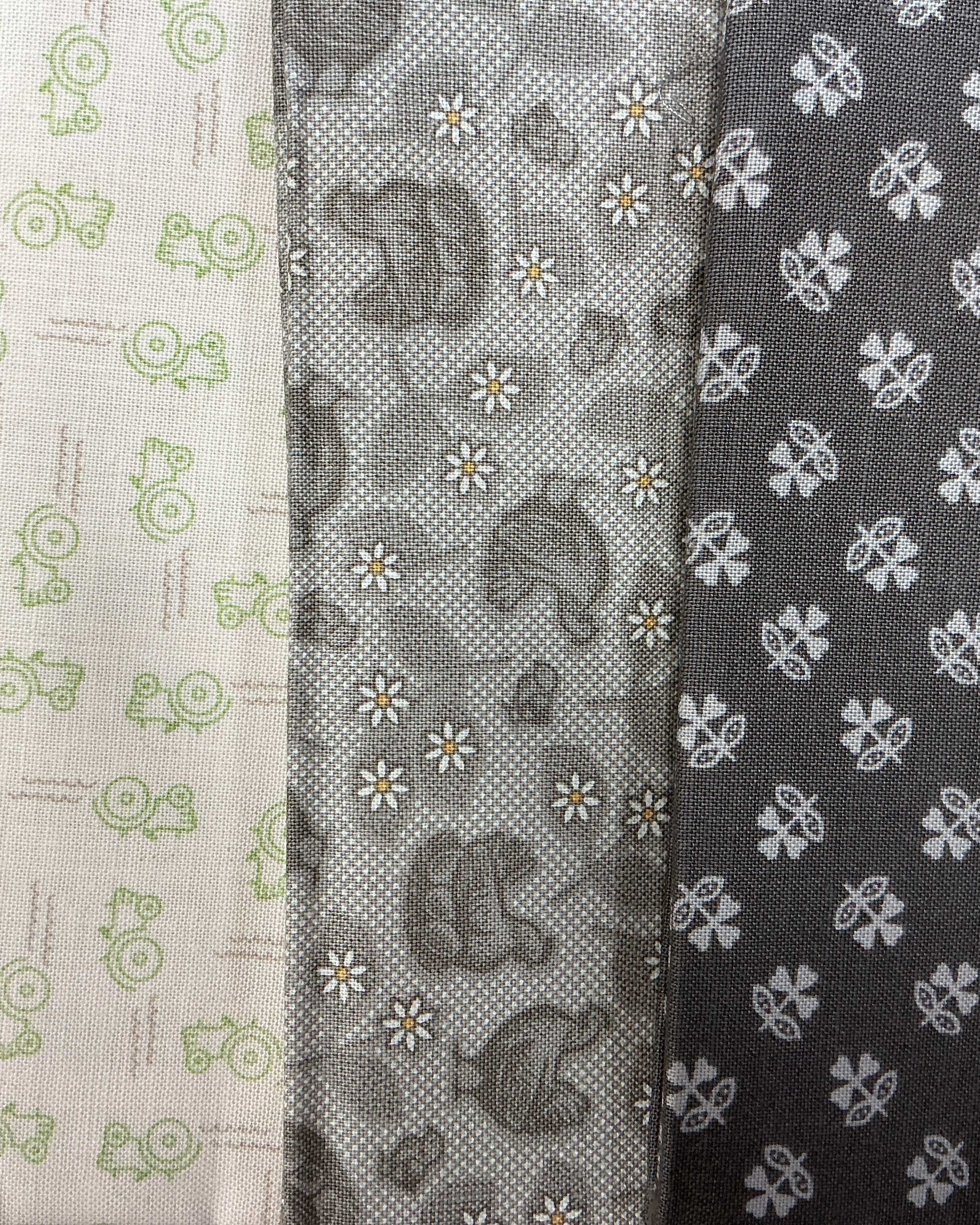 4 Yard Quilt Bundle with green and grey patterned fabric pieces for quilting projects