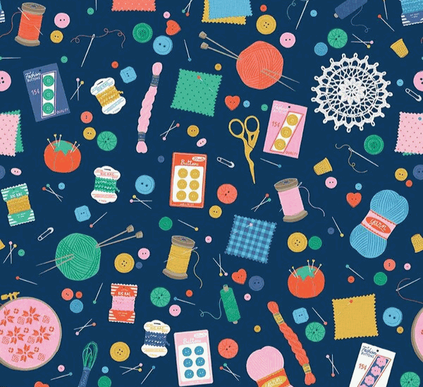Hand Made Navy Notions fabric by Amber Kemp-Gerstel featuring colorful sewing and quilting motifs on navy background