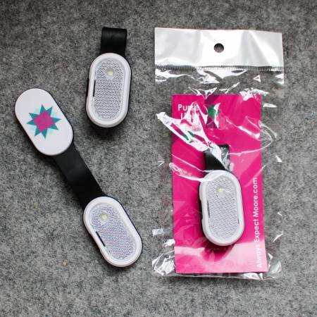 Compact Purse Light with clip and magnetic base for easy finding and sewing tasks